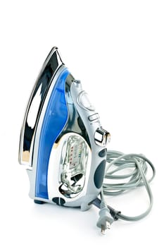 Electric iron with cord isolated on white background