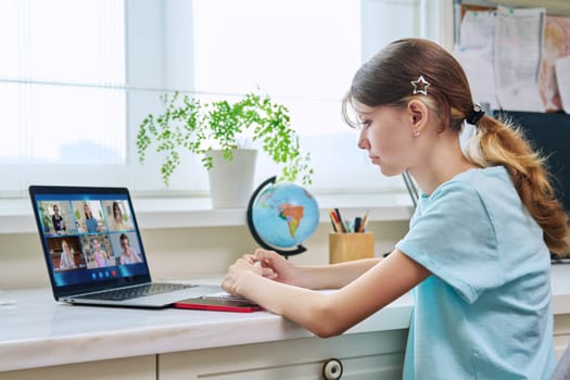 Video conference, preteen girl student looking at laptop screen with group of teenagers studying remotely at home. Online lesson distance learning course. E-learning e-education technology high school