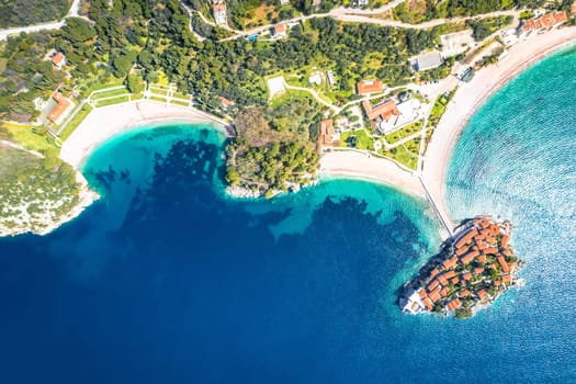 Sveti Stefan historic island village and beaches aerial view, archipelago of Montenegro