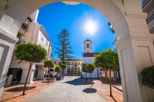 Town of Nerja white colorful street view, Andalusia region of Spain