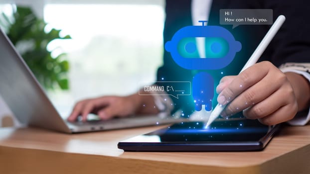 Businesswoman pointing stylus pen at tablet to type chat questions and answers with artificial intelligence chatbot assistant.