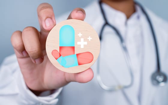 Doctor showing circle wood plank and medicine icon represents medical health care and doctor staff service concept. 