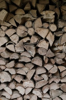 pile stacked natural sawn wooden logs background