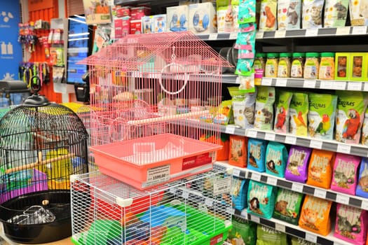 Moscow, Russia - Oct 19. 2023. Cages for birds and animals in the Four paws pet store at Zelenograd