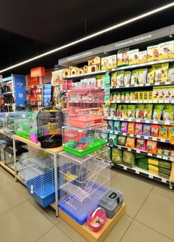 Moscow, Russia - Oct 19. 2023. Cages for birds and animals in the Four paws pet store at Zelenograd