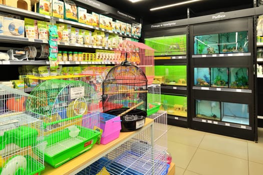 Moscow, Russia - Oct 19. 2023. Cages for birds and animals in the Four paws pet store at Zelenograd