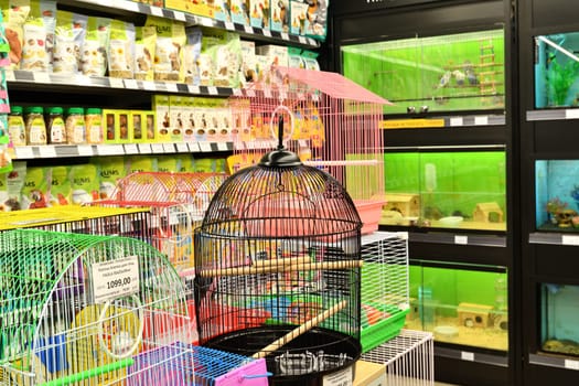 Moscow, Russia - Oct 19. 2023. Cages for birds and animals in the Four paws pet store at Zelenograd