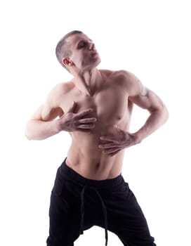 sexy young strong man posing in desire isolated