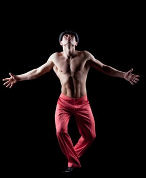 sexy young strong man posing in desire isolated