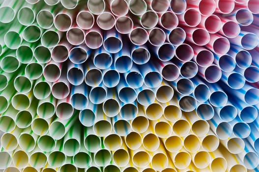 Close-up of a bunch of bright colored straws