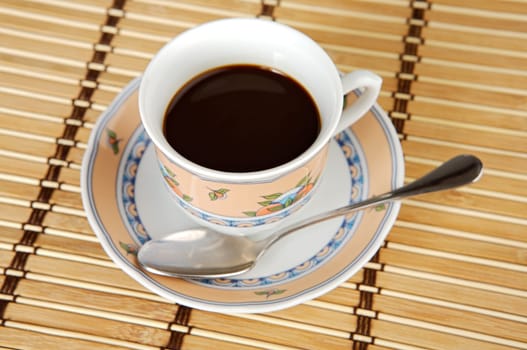 A photo of a Cup of coffee a over white background
