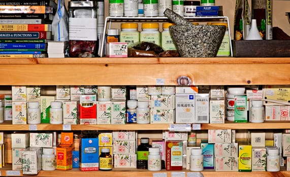Various traditional chinese medicine products on shelves