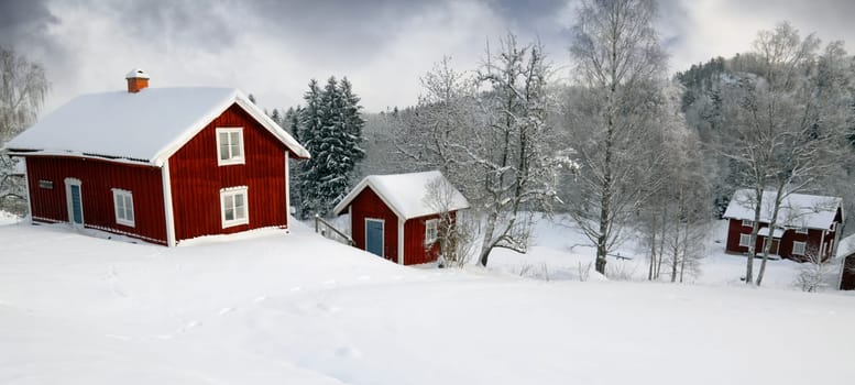 small red cottage, winter and snow scenery from sweden