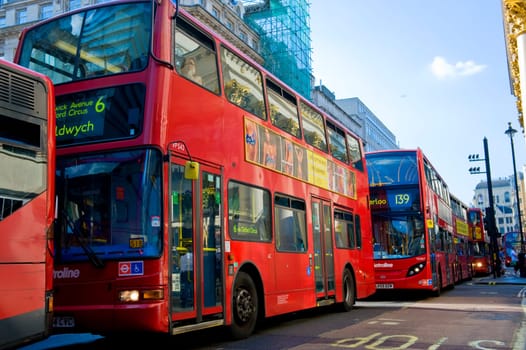 Red two-storeyed buses - one of symbols of London