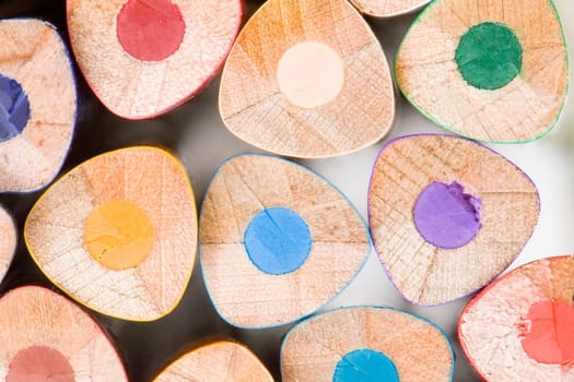 Many pencils of different colors on a over white background-Shallow DOF-