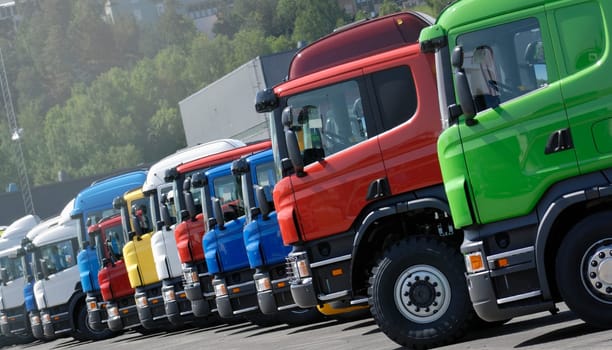 trucks, brand new standing on line, trucking convoy