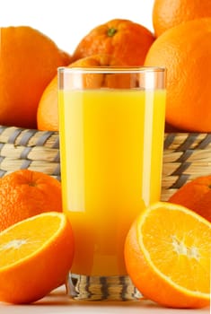 Composition with glass of orange juice and fruits