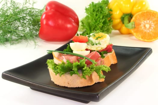 Various canapes against white background