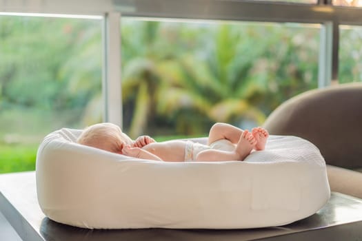 A newborn baby lies peacefully in their cozy sleep cocoon, gazing out of the window. A serene moment of curiosity and calm, symbolizing the early stages of life, peaceful reflection, and a connection with the outside world.