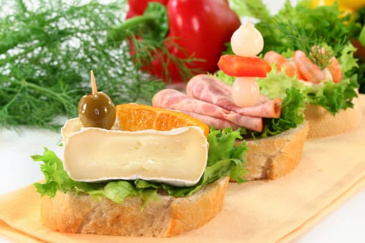Various colorful canapés on a napkin