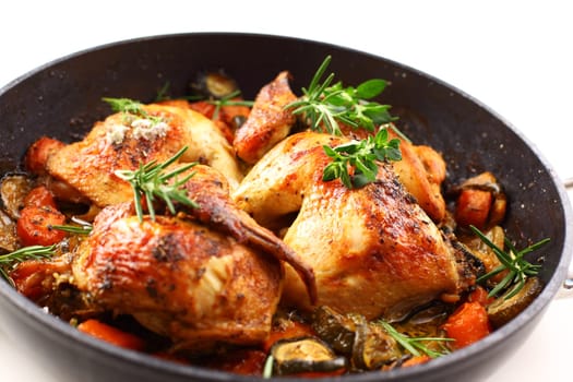 Tasty roasted chicken with vegetable and herbs