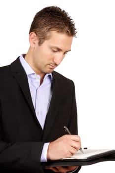 Young businessman taking notes over a white background