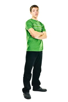 Serious young man standing full body with arms crossed isolated on white background