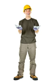 Young construction worker looking up shrugging isolated on white background