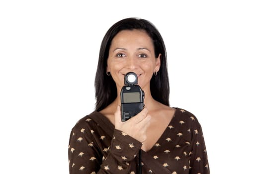 Brunette girl with a photometer isolated on white background