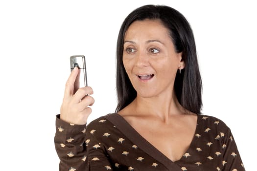 Attractive girl with a mobile isolated on white background