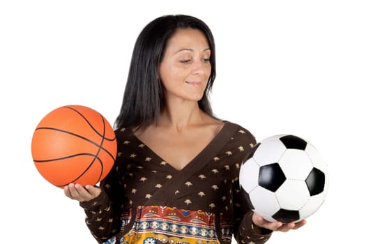 Attractive girl with soccer and basket ball isolated on white background