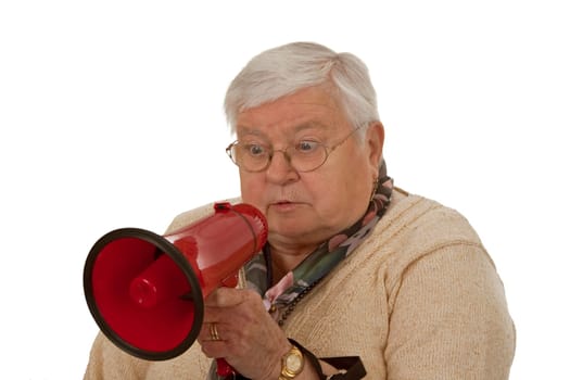 Senior woman with megaphone isolated on white background