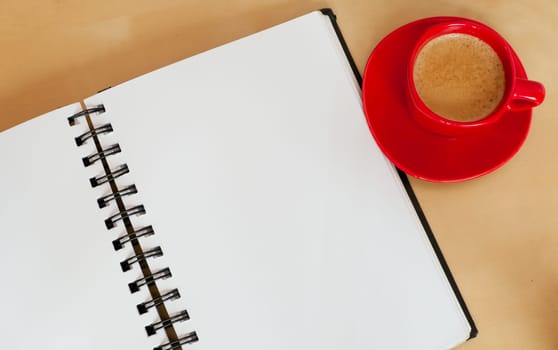 Espresso Coffee and Blank Paper Notebook on Wooden Table
