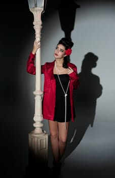 beautiful young glamorous woman  with lightpole