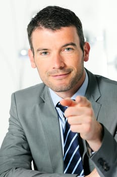 An attractive business man is helping you
