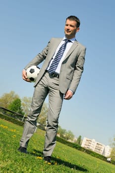 Business man coaching soccer