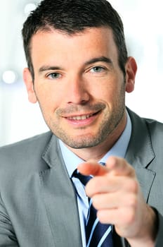 An attractive business man is helping you