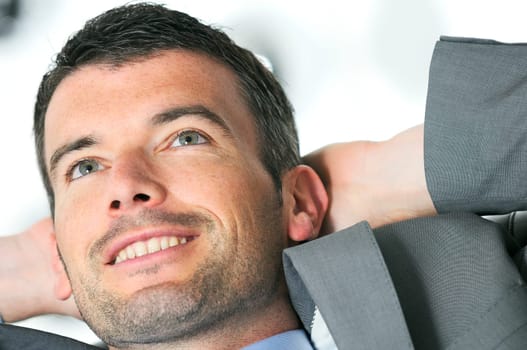 Attractive businessman is taking break from business