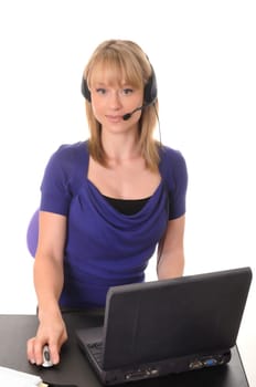 Lovely blond business woman working on a laptop