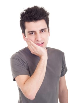young casual man having a toothache isolated on white background