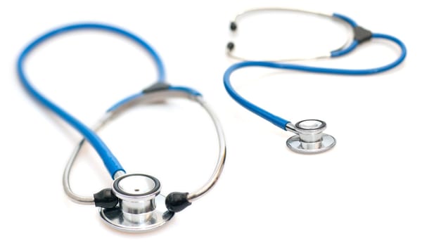 Two Blue Stethoscopes on White Background