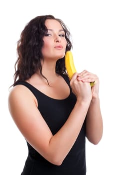 Beauty young woman with banana gun isolated
