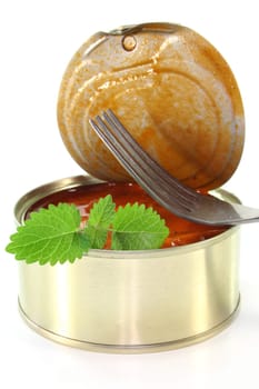 a can of musk octopus in tomato sauce