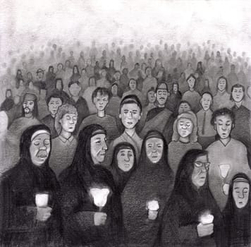 Many Catholic people praying in the Lady of Lourdes grotto pilgrimage site in Lourdes, France by candle light at night.