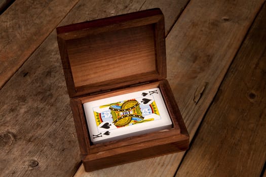 Playing cards in a wooden presentation box