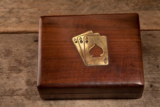 Playing cards in a wooden presentation box