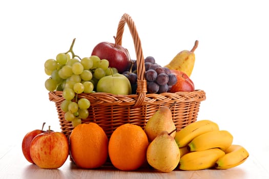 Composition with fruits and wicker basket