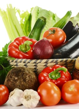 Composition with raw vegetables and kitchen dish
