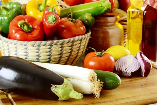Composition with raw vegetables on kitchen table