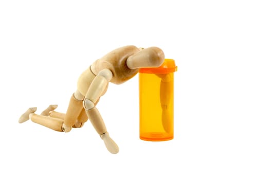 A Manikin reaching in pill bottle